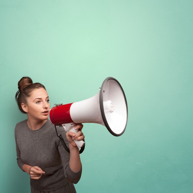 Person speaking in loudspeaker concept-1